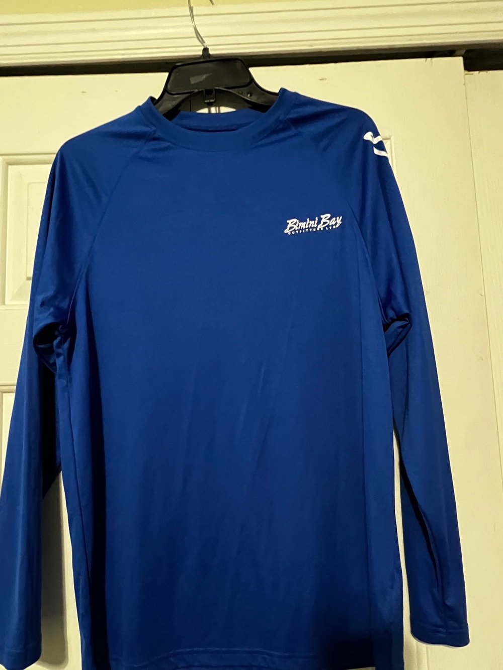 Bimini Bay Blue long sleeved sun shirt. Size small